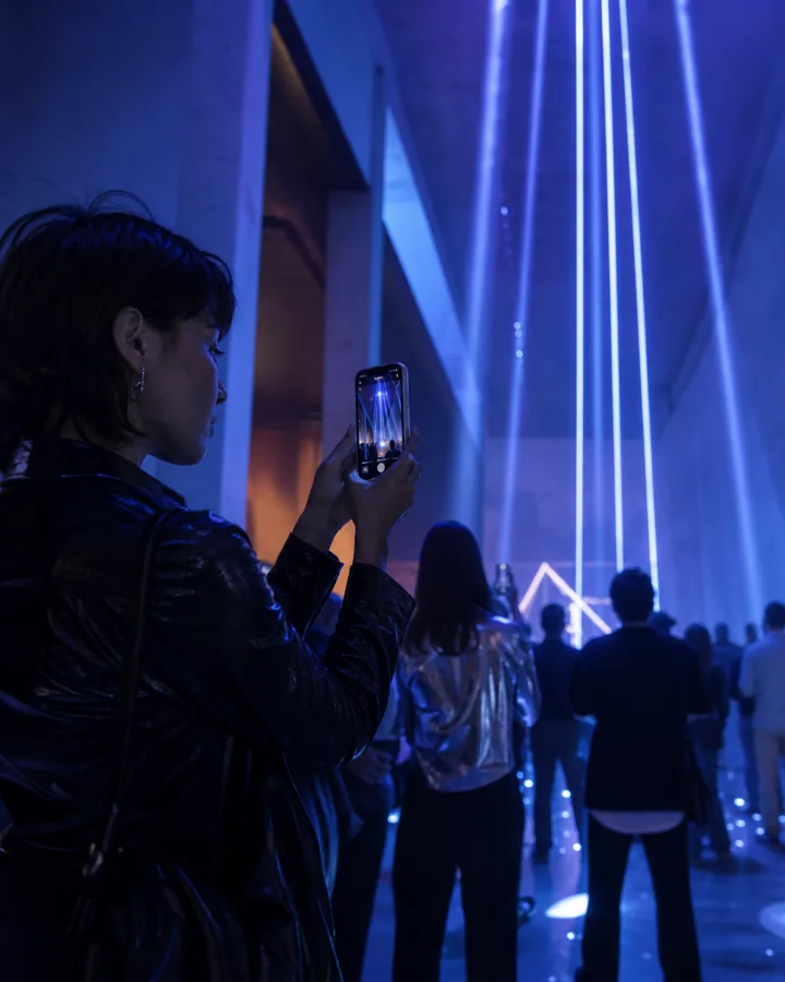A creator documenting a sophisticated immersive cultural installation